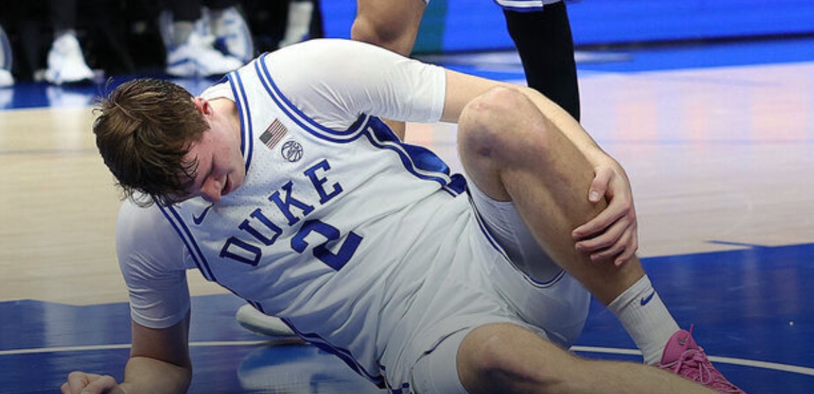 Duke’s Flagg helped off court after spraining ankle